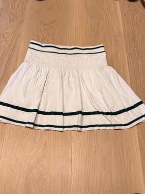 White Pleated Tennis Skirt with Green Trim